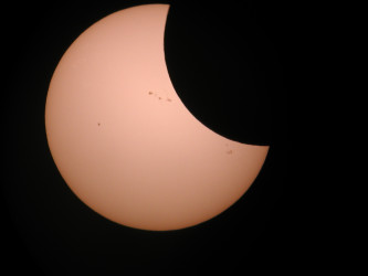 Photo of the solar eclipse of 12/25/2000 by Tim Martin