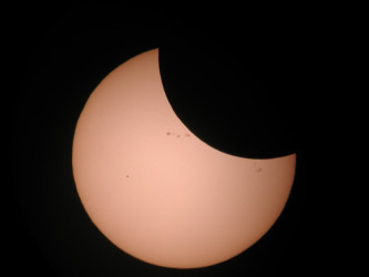 Photo of the solar eclipse of 12/25/2000 by Tim Martin